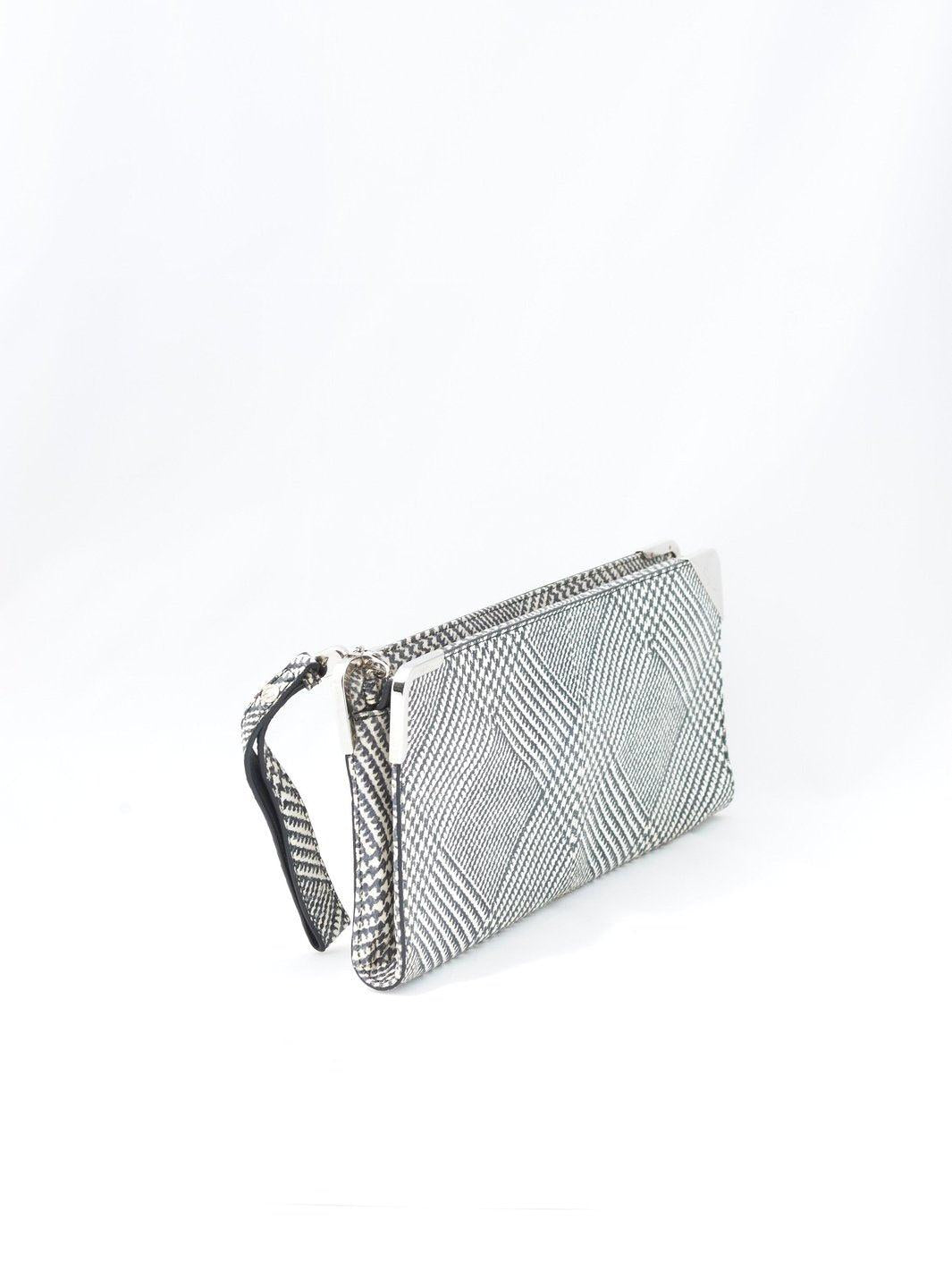 20 世纪 90 年代 Salvatore Ferragamo 皮革手提包,配以 pied de poule 印花