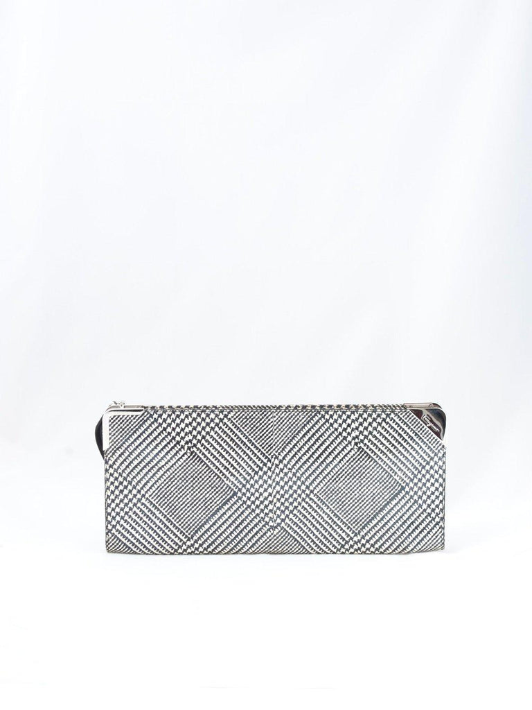 20 世纪 90 年代 Salvatore Ferragamo 皮革手提包,配以 pied de poule 印花