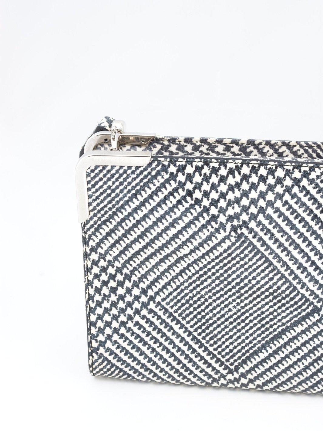 20 世纪 90 年代 Salvatore Ferragamo 皮革手提包,配以 pied de poule 印花