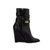 Givenchy "Shark" black leather ankle boots, zip fastening pre-owned
