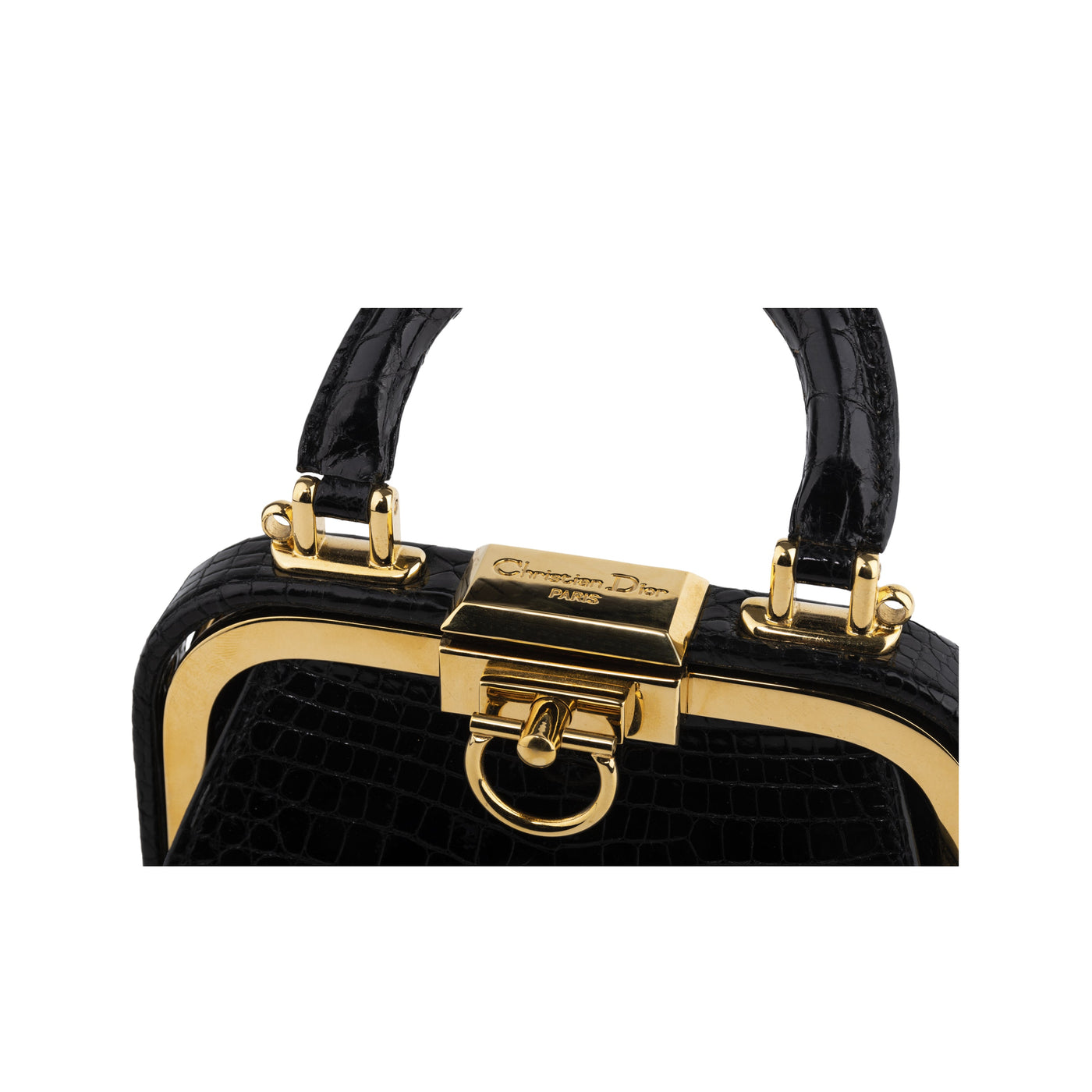 Dior black alligator leather mini bag. "Doctor Bag" style with snap closure and golden details. Interior lined in black calfskin with pocket pre-owned nft