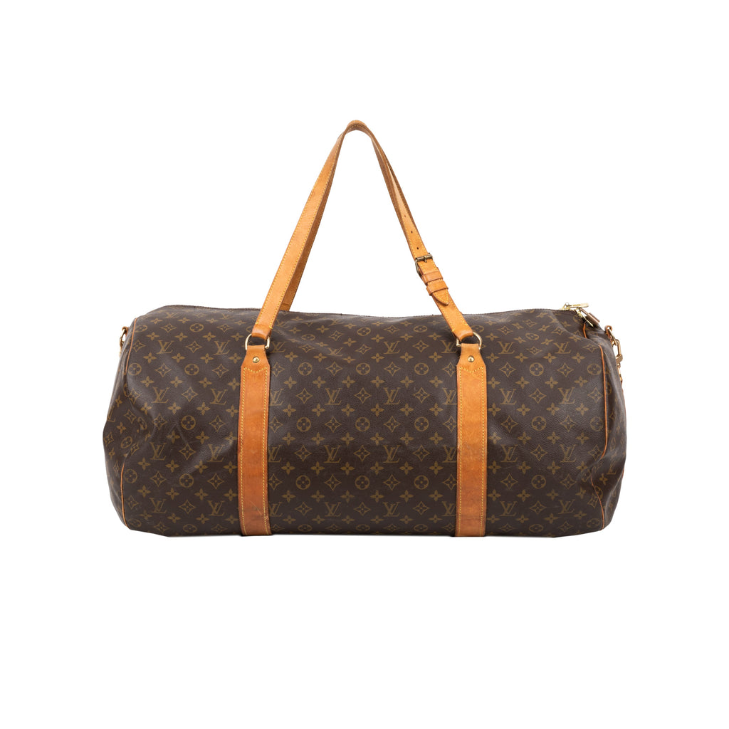 Louis Vuitton brown leather travel bag. Featuring interior pockets, zip closure and shoulder strap pre owned nft