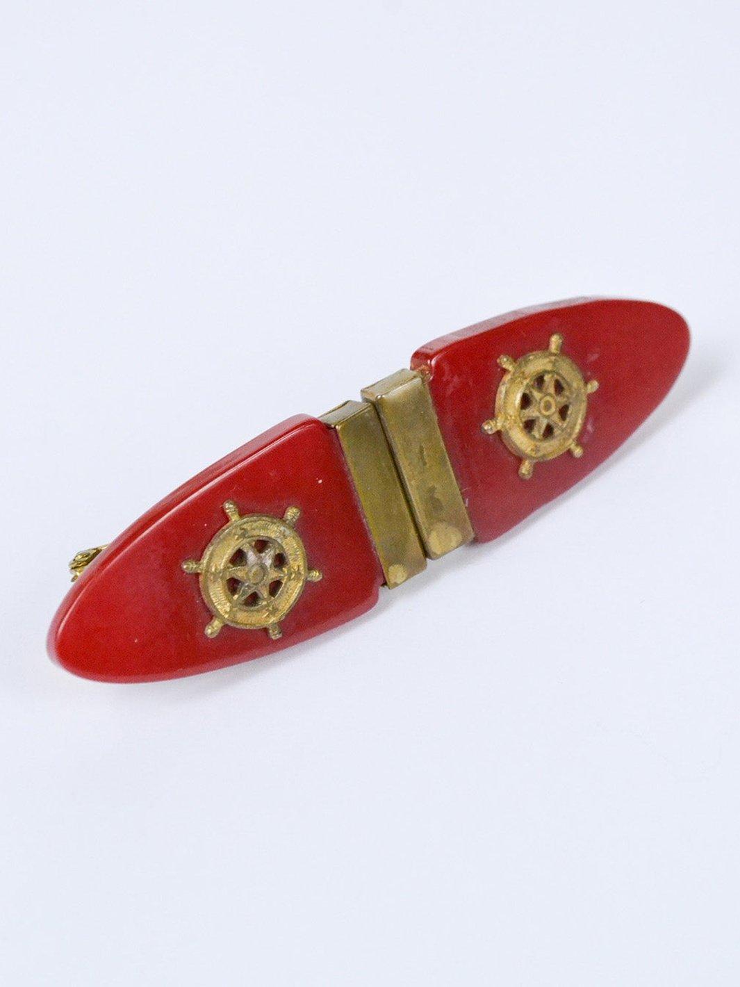 1980s brooch in red plastic and metal with marittime theme W22051804  Vintage 