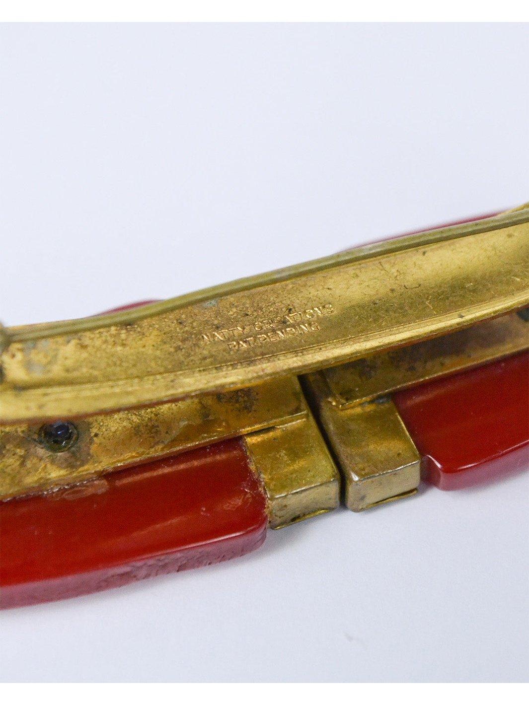 1980s brooch in red plastic and metal with marittime theme W22051804  Vintage 
