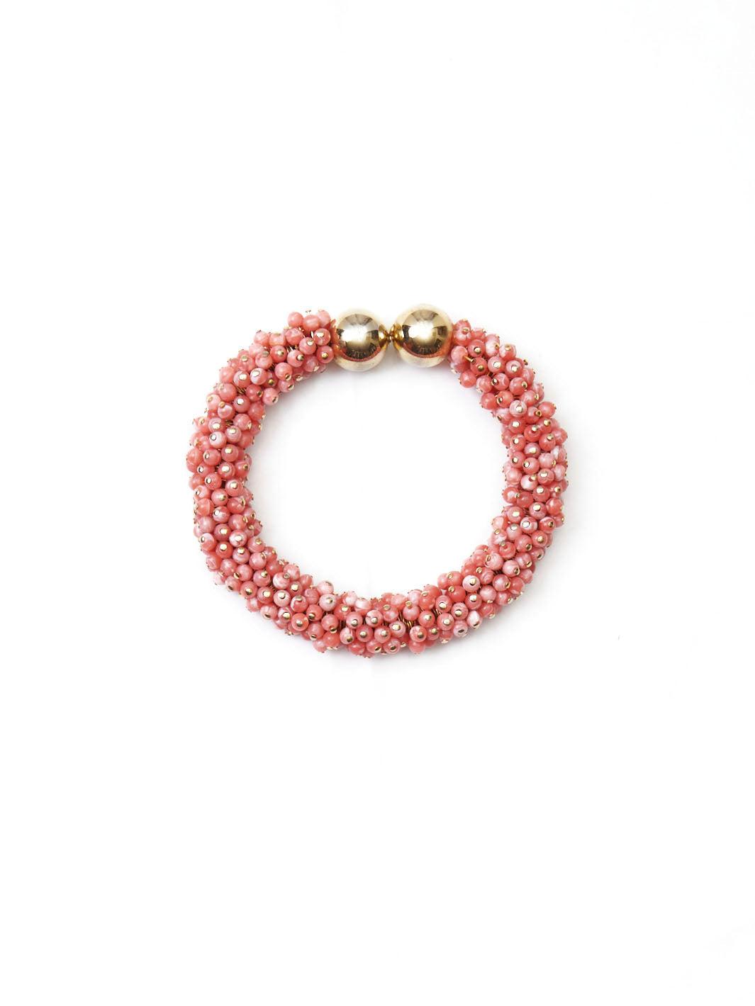 1980s Nina Ricci semi-rigid bracelet in coral-colored beads W2203316  Nina Ricci 