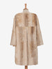 Pelliccia beige di lunghezza midi<br>