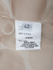 Pelliccia beige di lunghezza midi<br>