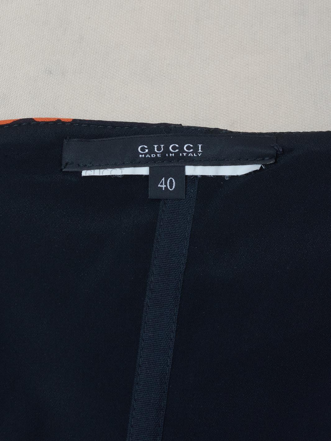 Abito Gucci con applicazione rosa