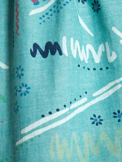 1950s inspired midi skirt in teal cotton with abstract pattern