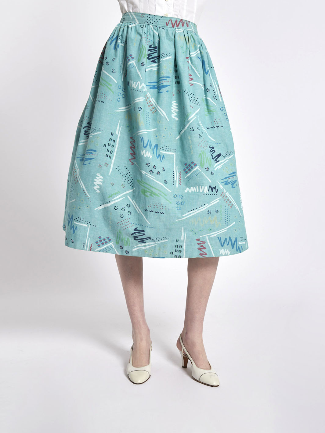 1950s inspired midi skirt in teal cotton with abstract pattern