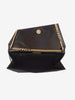 Clutch in black satin with gold details