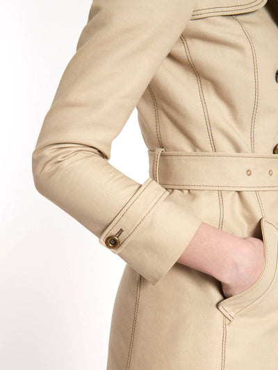 Y2K Balenciaga trench coat in beige with contrasting stitching.