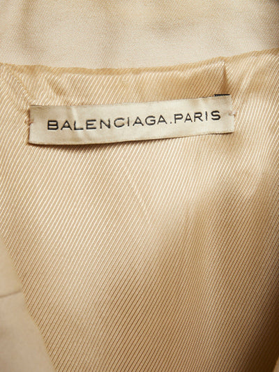 Y2K Balenciaga trench coat in beige with contrasting stitching.