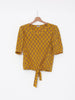 Chanel Boutique suit in ochre yellow silk