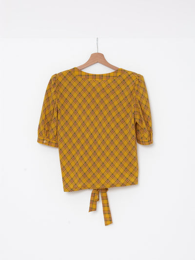 Chanel Boutique suit in ochre yellow silk