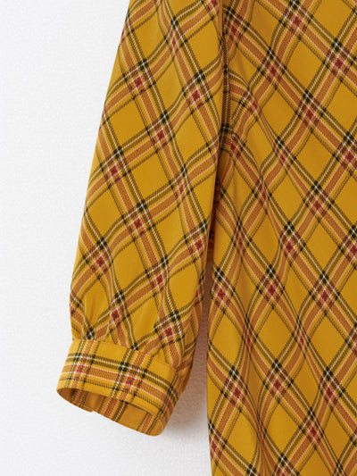 Chanel Boutique suit in ochre yellow silk