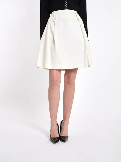 Y2K cream-coloured Chanel over-the-knee skirt