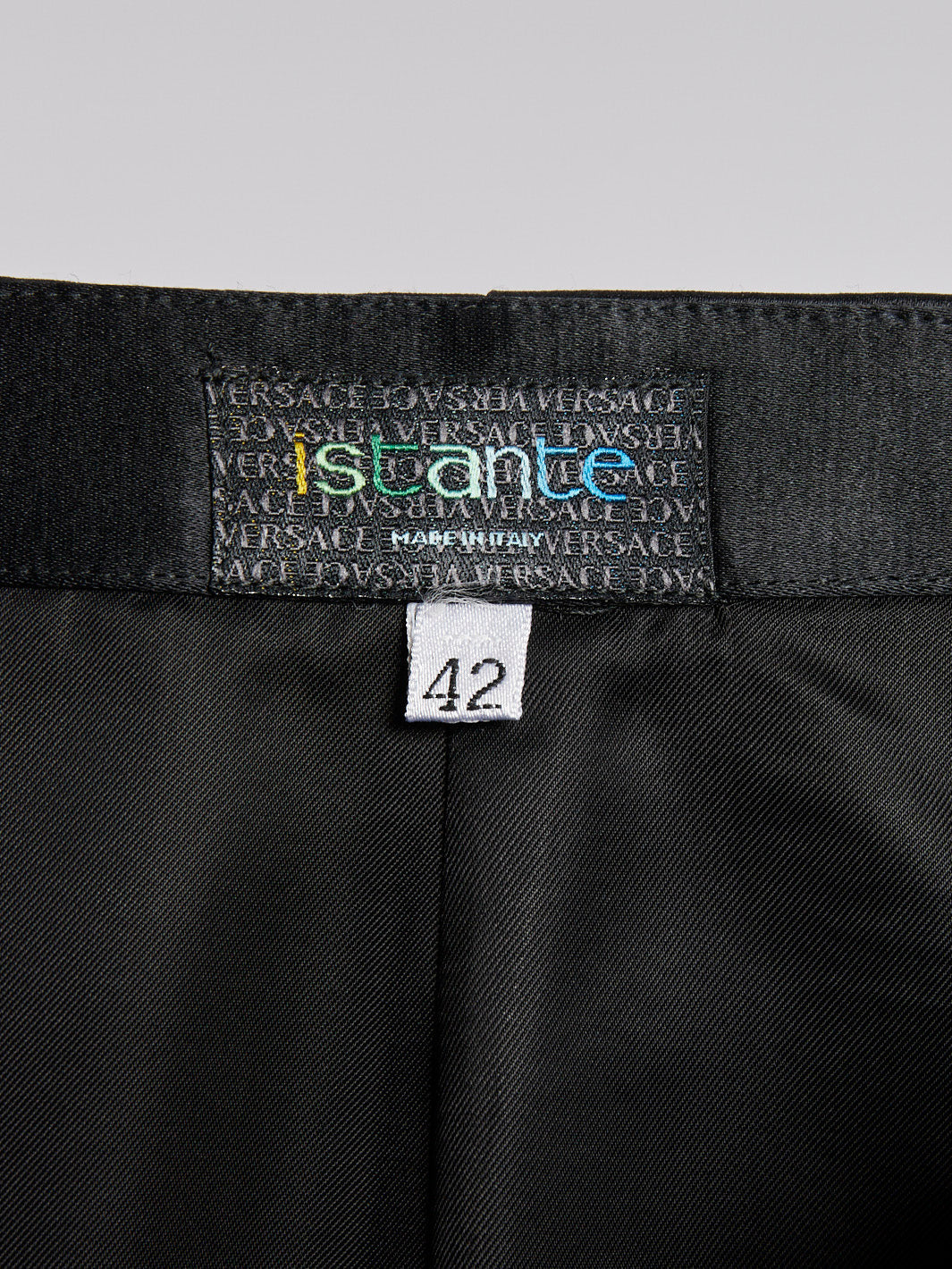 Black satin Istante miniskirt from the 1990s