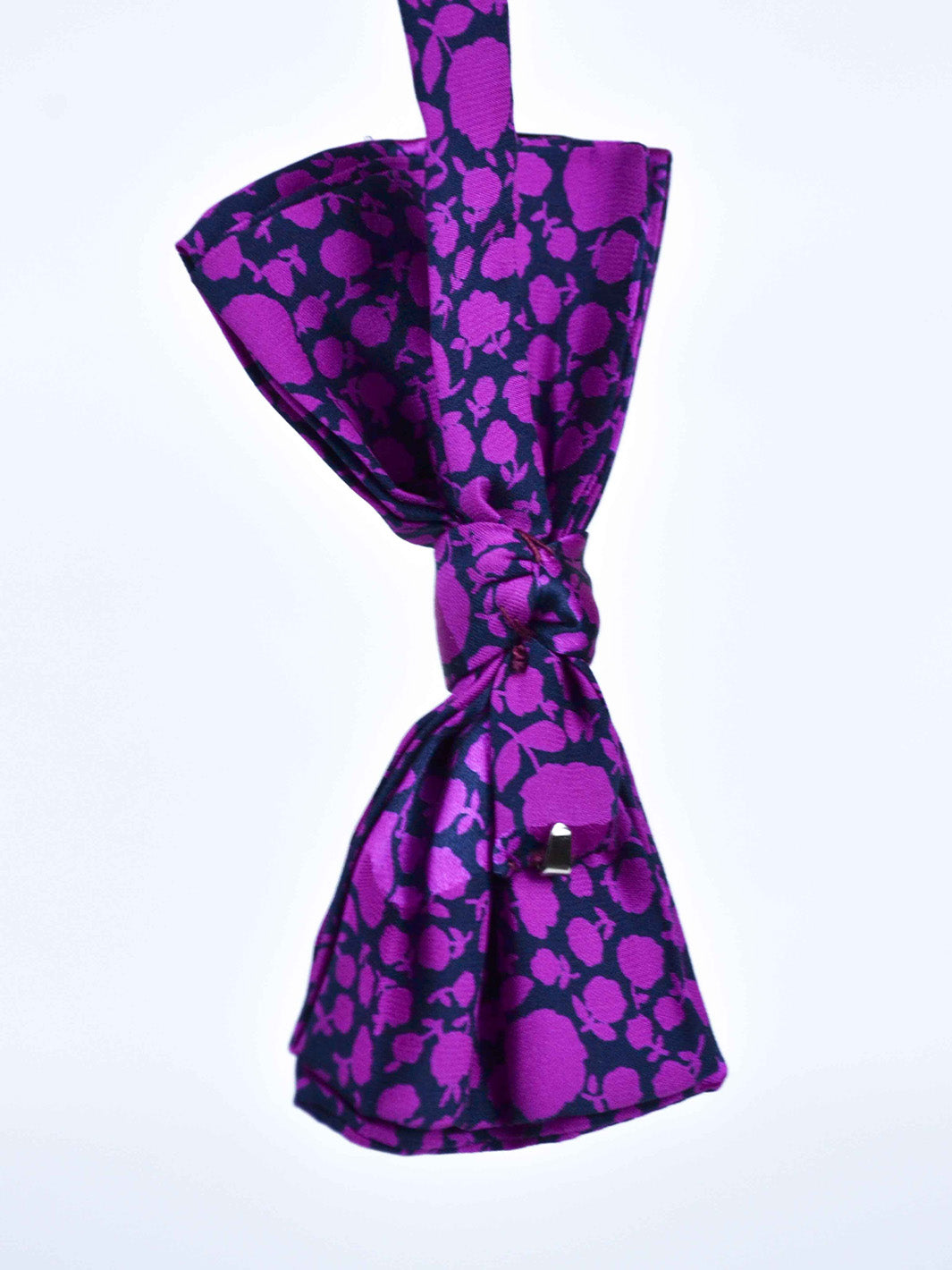1980s silk bow tie with violet flowery print on black background