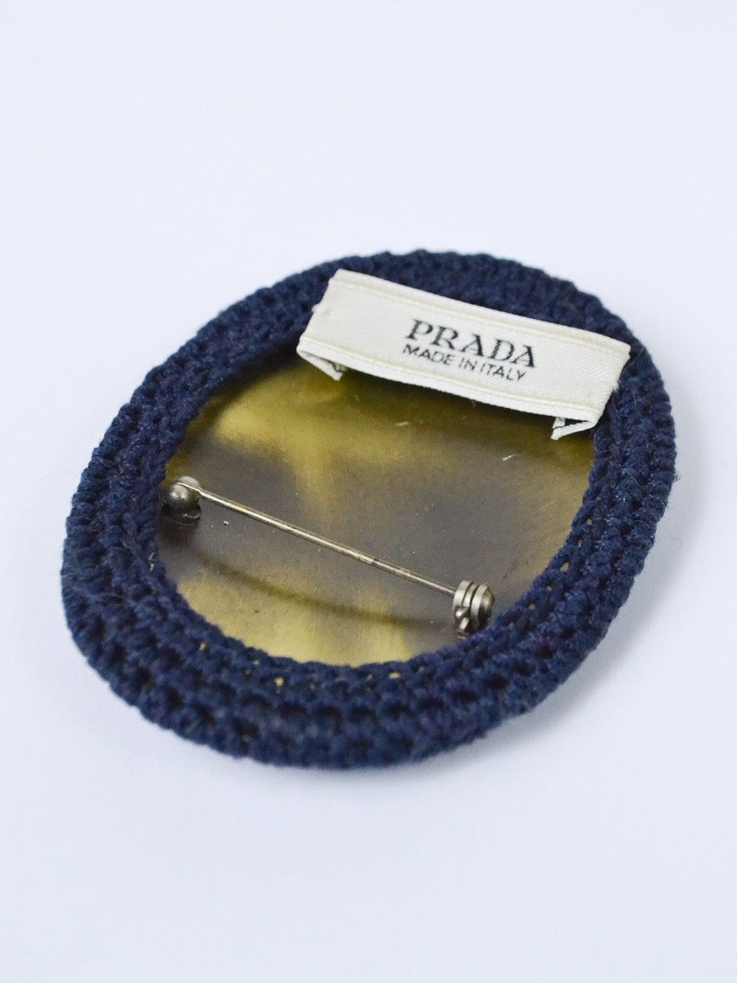Y2K Prada brooch with crochet embroidery